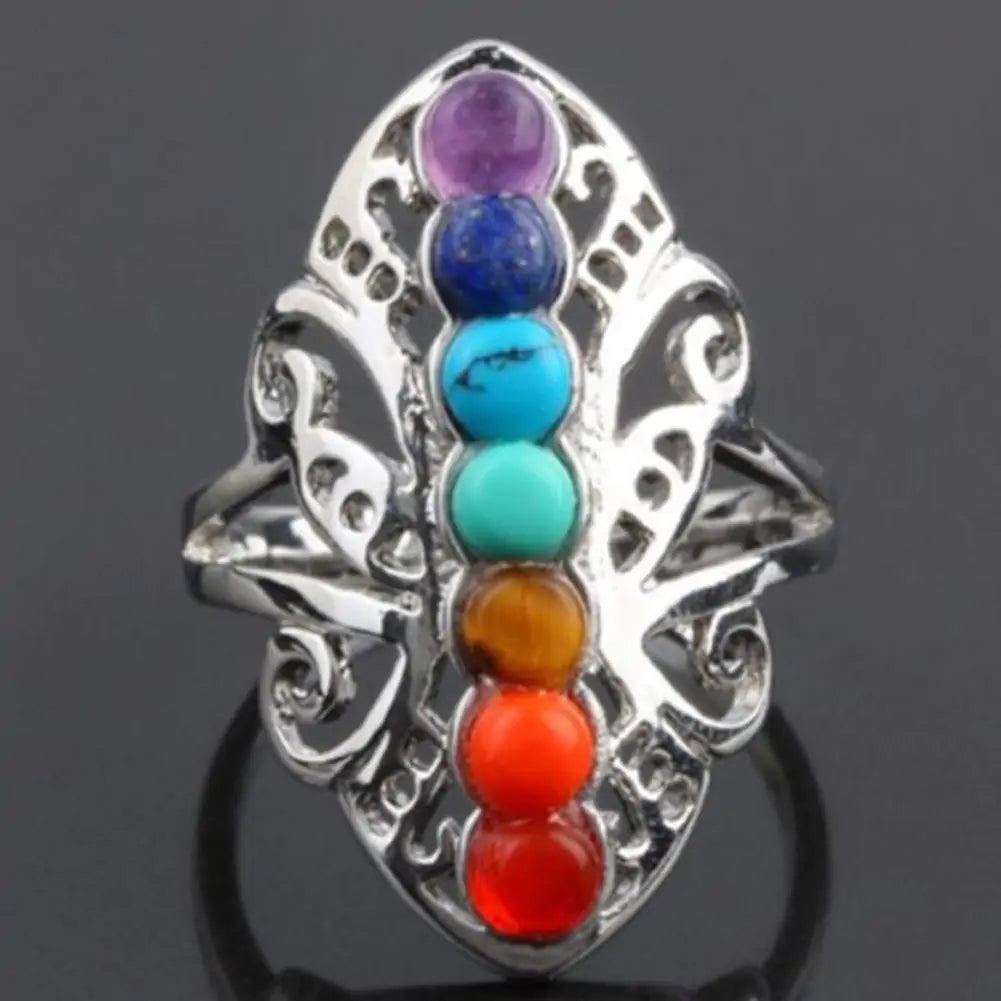 Balance Your Energy:  Harmonize your mind, body, and spirit with our Chakra Healing Ring. Designed with seven vibrant stones, each representing a different chakra, it helps restore balance and promote positive energy flow throughout your body.  Handcrafte